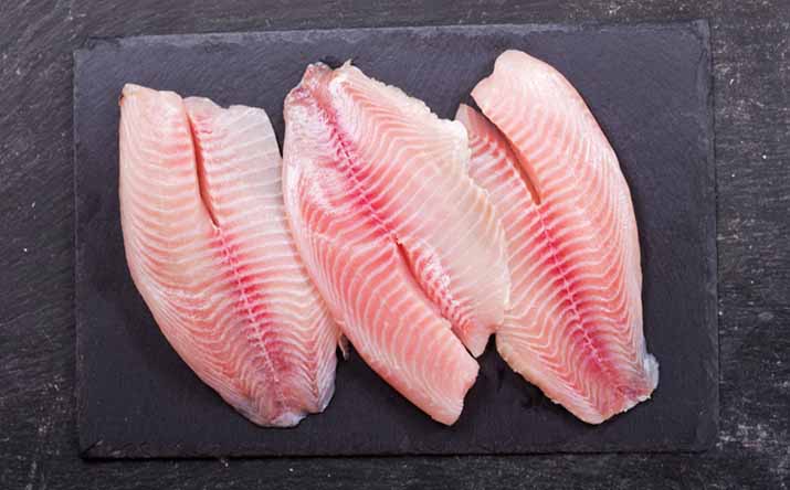 Filetes cortados y preparados para cocinar un pescado. Filetes cortados y preparados para cocinar un pescado.