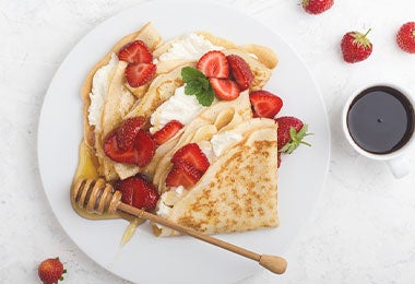 Crêpes suzette con fresa.