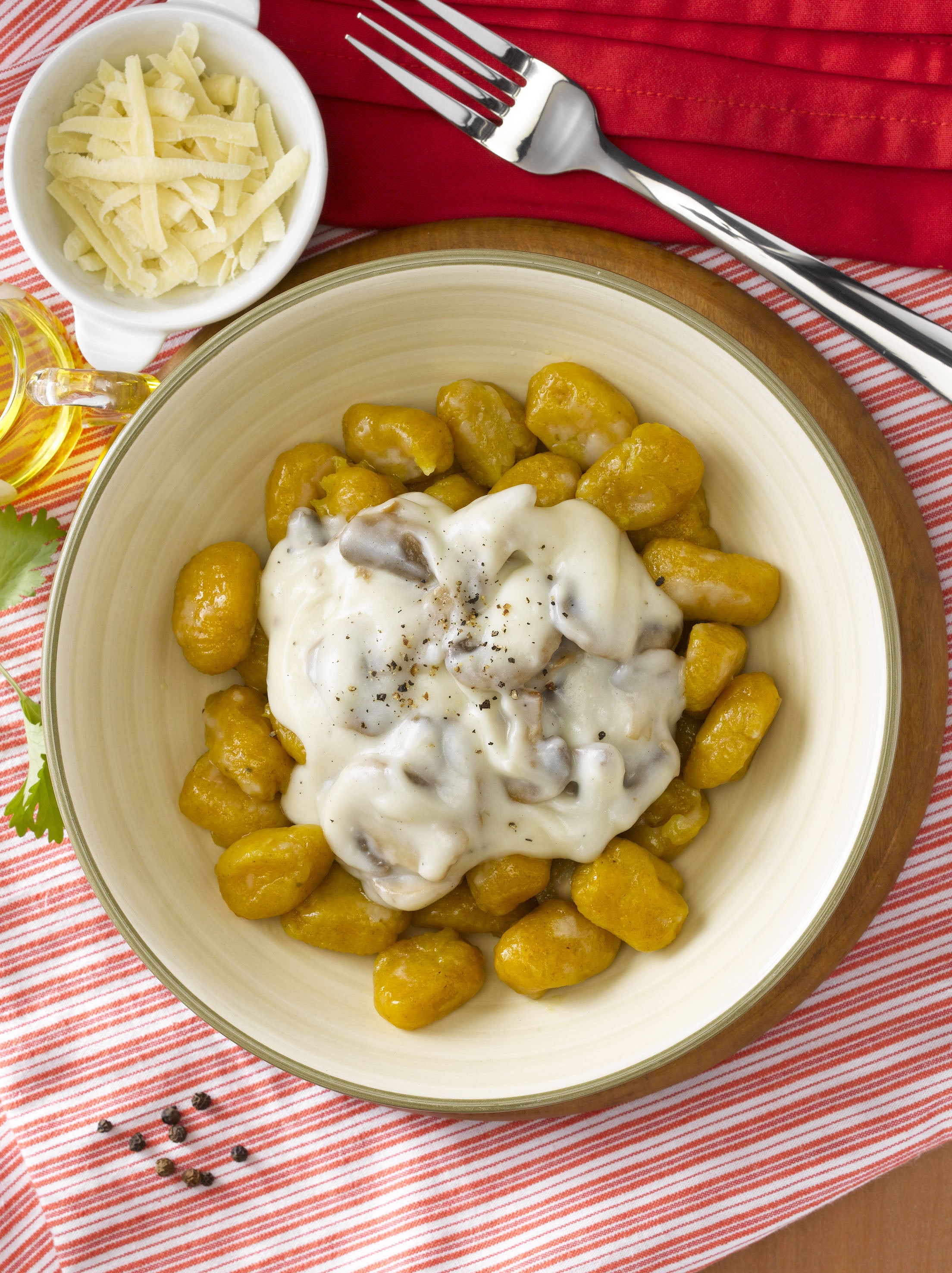 Gnocchi de Zapallo con Salsa de Queso y Champiñones