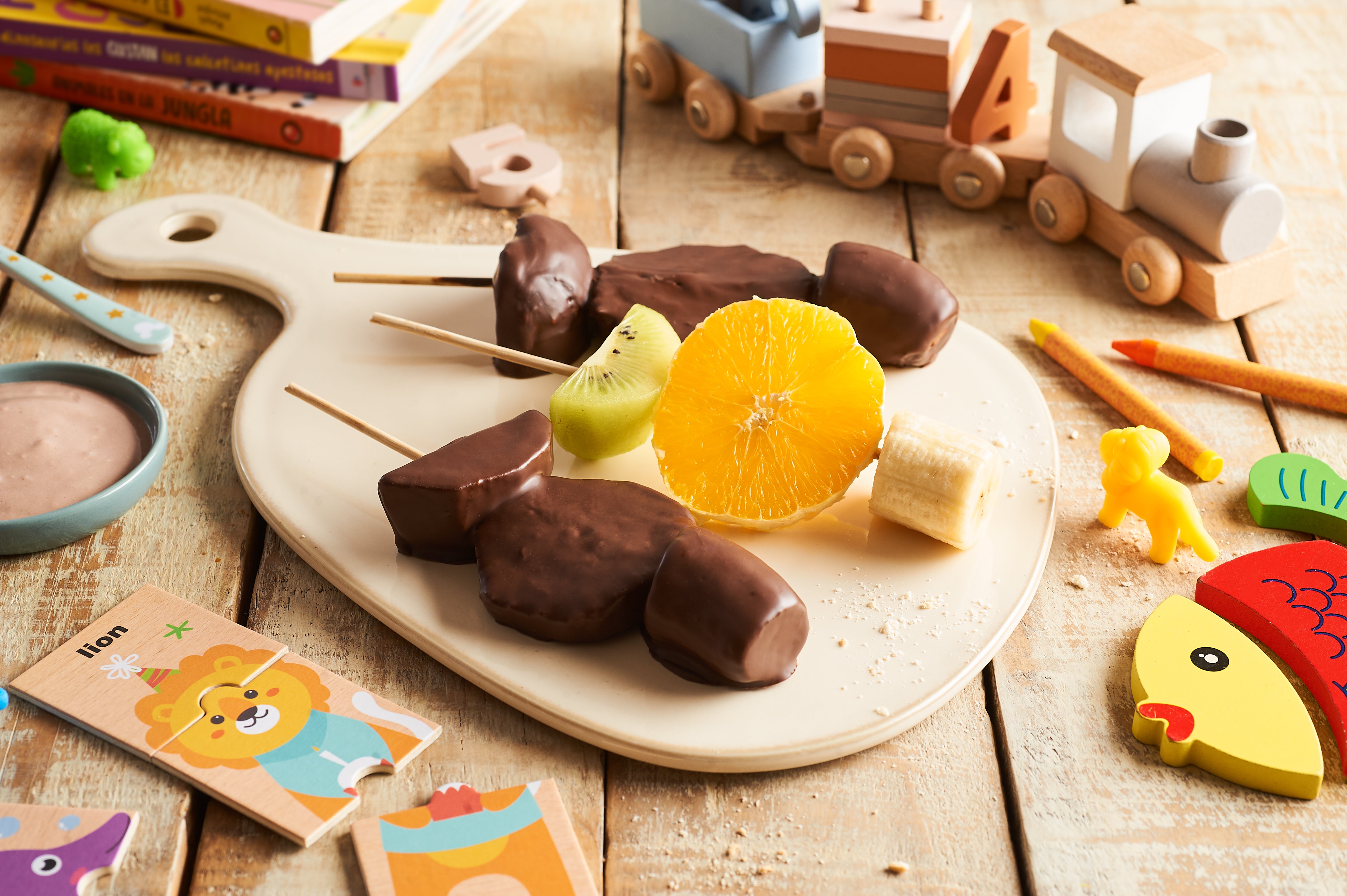 Paletas de fruta y NIDO® chocolate