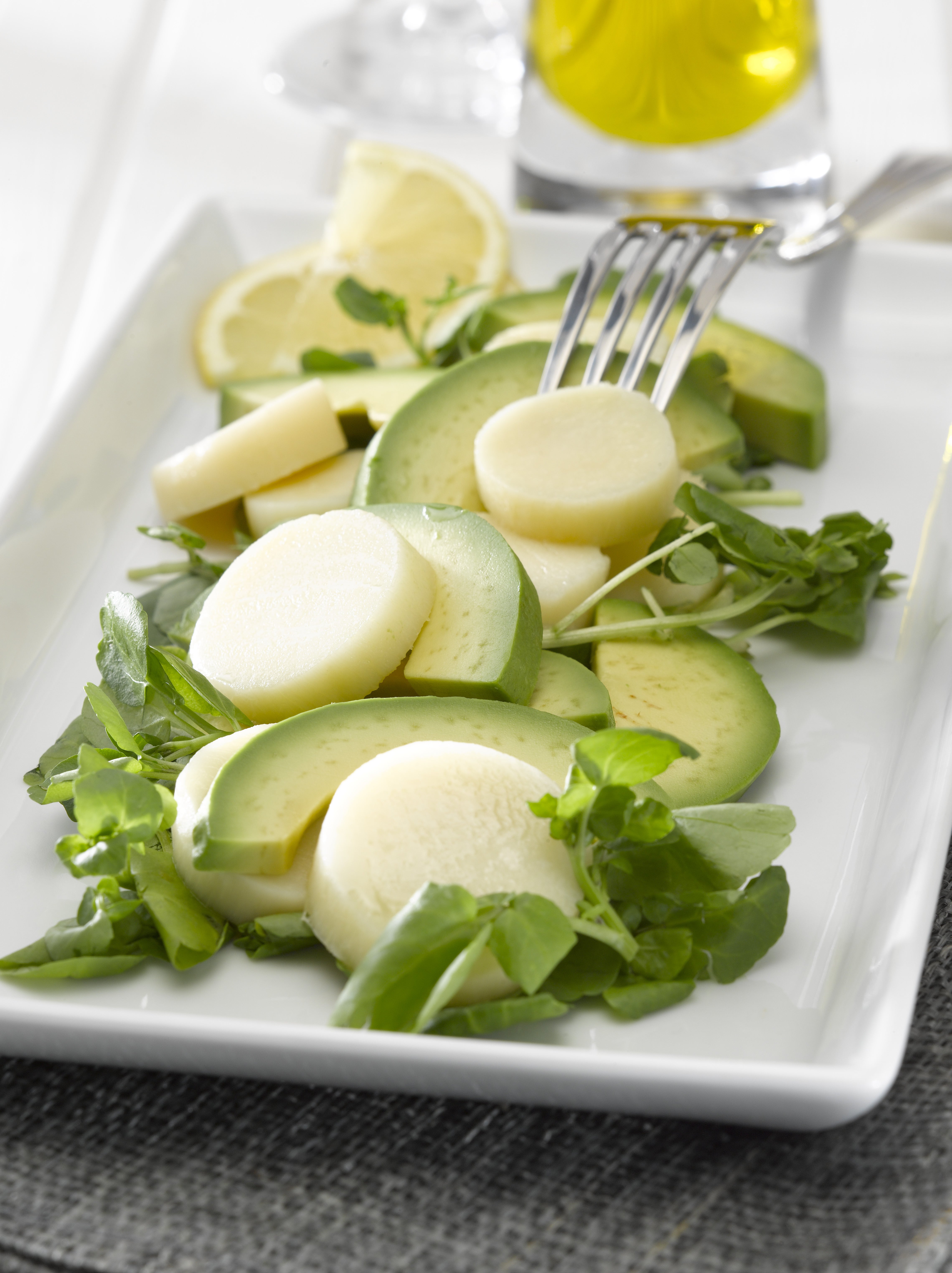 Ensalada de palmitos y palta con berros