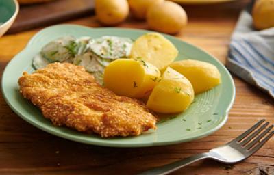 Plato con receta de milanesa empanada con pan rallado