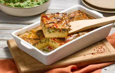 Pastel de verduras con puré de espinacas