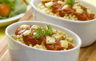 Gratín de fideos con tuco y queso Gratín de fideos con tuco y queso