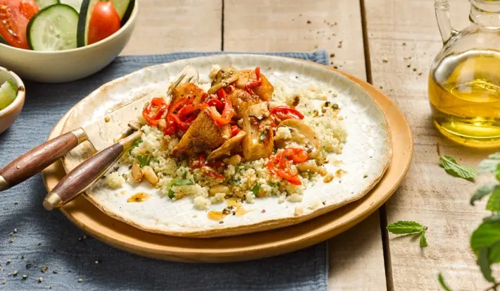 Pollo salteado con cous cous y frutos secos